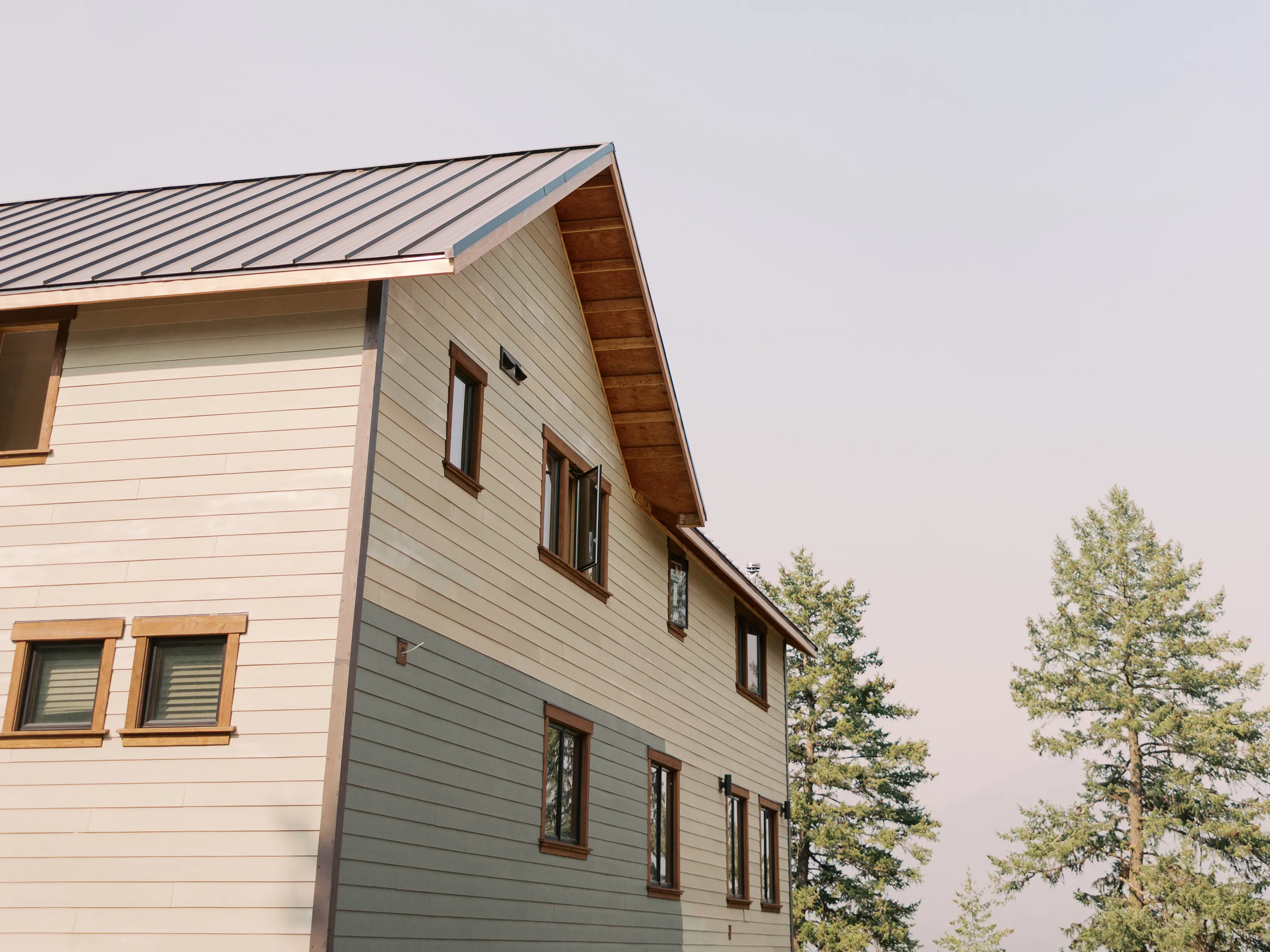 A KCW custom home exterior among the pines